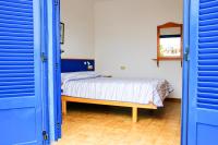 Posteľ alebo postele v izbe v ubytovaní Seaview Risco de Famara 1