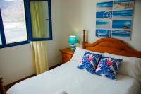 Posteľ alebo postele v izbe v ubytovaní Seaview Risco de Famara 1
