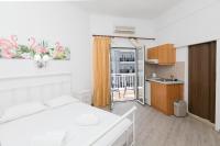 A kitchen or kitchenette at Kallithea Studios