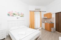A kitchen or kitchenette at Kallithea Studios