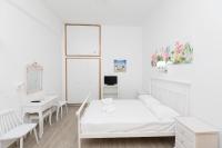 A bed or beds in a room at Kallithea Studios