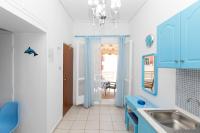 A kitchen or kitchenette at Kallithea Studios