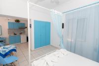 A bed or beds in a room at Kallithea Studios
