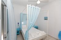 A bed or beds in a room at Kallithea Studios