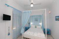 A bed or beds in a room at Kallithea Studios
