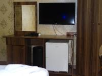 TV a/nebo společenská místnost v ubytování Meta Hotel