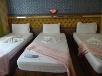 Postel nebo postele na pokoji v ubytování Meta Hotel