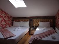 Postel nebo postele na pokoji v ubytování Meta Hotel