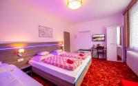 Posteľ alebo postele v izbe v ubytovaní Guesthouse Cyprian