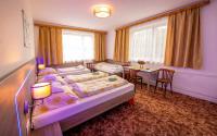 Posteľ alebo postele v izbe v ubytovaní Guesthouse Cyprian