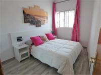 Łóżko lub łóżka w pokoju w obiekcie Rosamar Luxury Apartment
