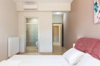 Posteľ alebo postele v izbe v ubytovaní Eudora Luxury Stone Villa