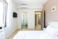 Posteľ alebo postele v izbe v ubytovaní Eudora Luxury Stone Villa