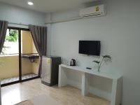 TV a/nebo společenská místnost v ubytování Prukpibul Apartment