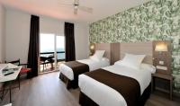 Postel nebo postele na pokoji v ubytování Hotel Salobreña Suites