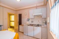 Kuchyňa alebo kuchynka v ubytovaní Apartment Vilma Funtana