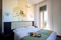 Posteľ alebo postele v izbe v ubytovaní Hotel Bellavista