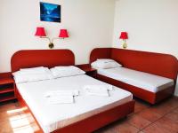 Posteľ alebo postele v izbe v ubytovaní Hotel Nap