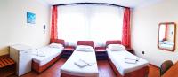 Posteľ alebo postele v izbe v ubytovaní Hotel Nap