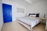 Łóżko lub łóżka w pokoju w obiekcie Marine Lovers - Jacuzzi Fuerteventura