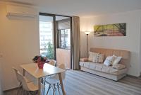 A seating area at Recently refurbished apartment with sea views.