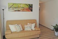 A seating area at Recently refurbished apartment with sea views.