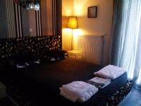 A bed or beds in a room at Greek hospitality 2