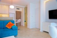 Televízia a/alebo spoločenská miestnosť v ubytovaní Sea Cliff Apartment Rewal