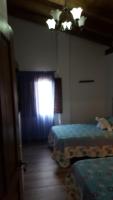Postel nebo postele na pokoji v ubytování Casas Rurales Almoguer
