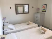 Postel nebo postele na pokoji v ubytování Villa El Gallo