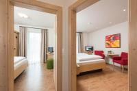 Posteľ alebo postele v izbe v ubytovaní Aktiv Hotel Schweizerhof Kitzbühel