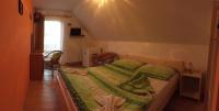 A bed or beds in a room at Privat Greta