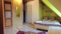 A bed or beds in a room at Privat Greta
