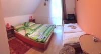 A bed or beds in a room at Privat Greta