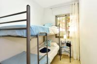 Postel nebo postele na pokoji v ubytování Beach House Adelfas San Agustín MCI