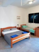 Posteľ alebo postele v izbe v ubytovaní Blue Holidays Apartment