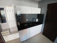 Kuchyň nebo kuchyňský kout v ubytování Apartamenty Aleksandria