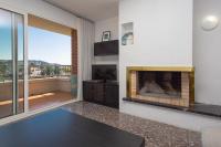 TV a/nebo společenská místnost v ubytování Tranquilidad junto al mar con piscina
