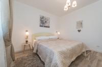 Postel nebo postele na pokoji v ubytování Sakarun House - Ivana