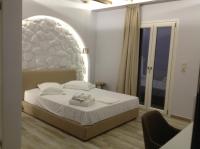 Posteľ alebo postele v izbe v ubytovaní Kallithea Hotel