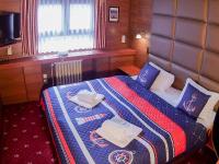 Postel nebo postele na pokoji v ubytování Botel Albatros