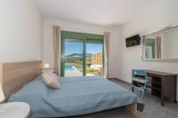 Posteľ alebo postele v izbe v ubytovaní Eora Bungalows
