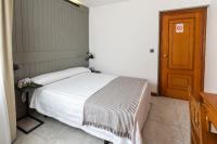 Postel nebo postele na pokoji v ubytování Hotel Panadeiramar