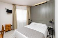 Postel nebo postele na pokoji v ubytování Hotel Panadeiramar