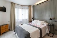 Postel nebo postele na pokoji v ubytování Hotel Panadeiramar