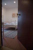 Posteľ alebo postele v izbe v ubytovaní Casa Miele Ortigia