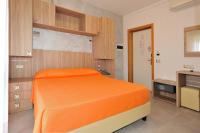 Posteľ alebo postele v izbe v ubytovaní Hotel Lidia