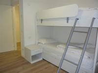 Łóżko lub łóżka w pokoju w obiekcie Trentino Apartments - Casa ai Tolleri