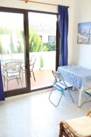 A balcony or terrace at Estepona - Playa - Estudio con terraza solárium Pi16