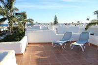 A balcony or terrace at Estepona - Playa - Estudio con terraza solárium Pi16